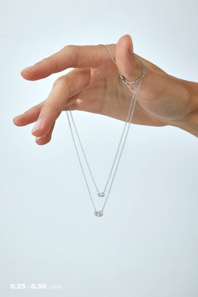 Oval Floating Diamond Necklace on Model in 14K White Gold