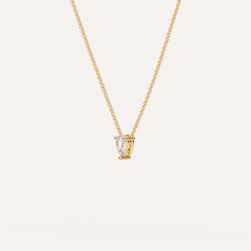 Yellow Gold Floating Diamond Necklace With 1/4 Carat Pear Diamond
