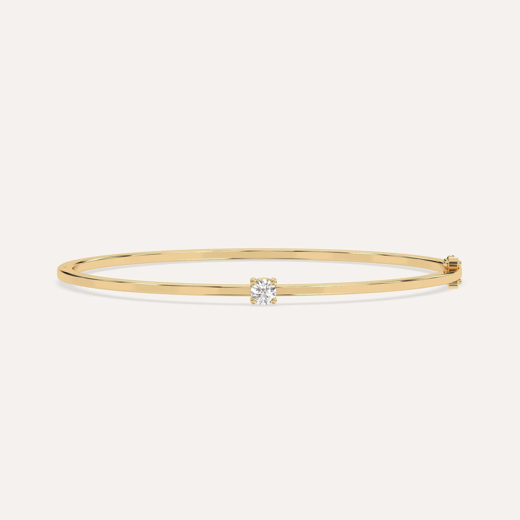 1/4 carat diamond solitaire, bangle bracelet in 14K yellow gold