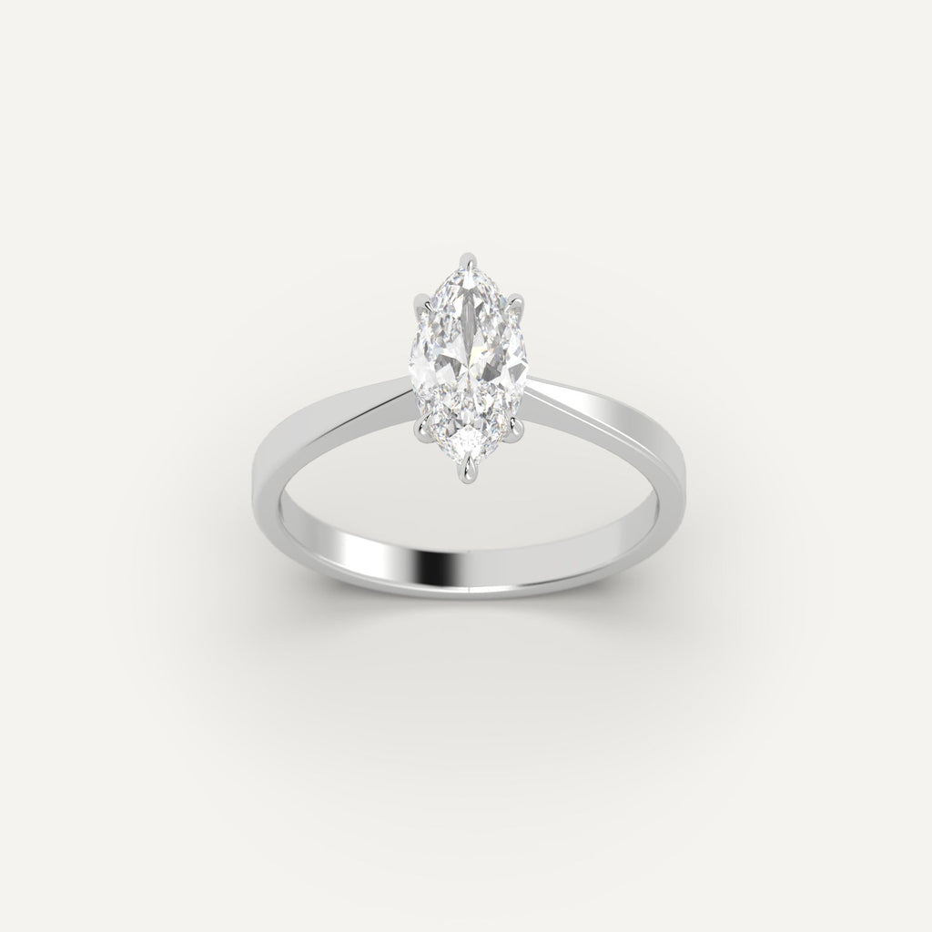 White Gold 1 Carat Engagement Ring On Woman's Hand