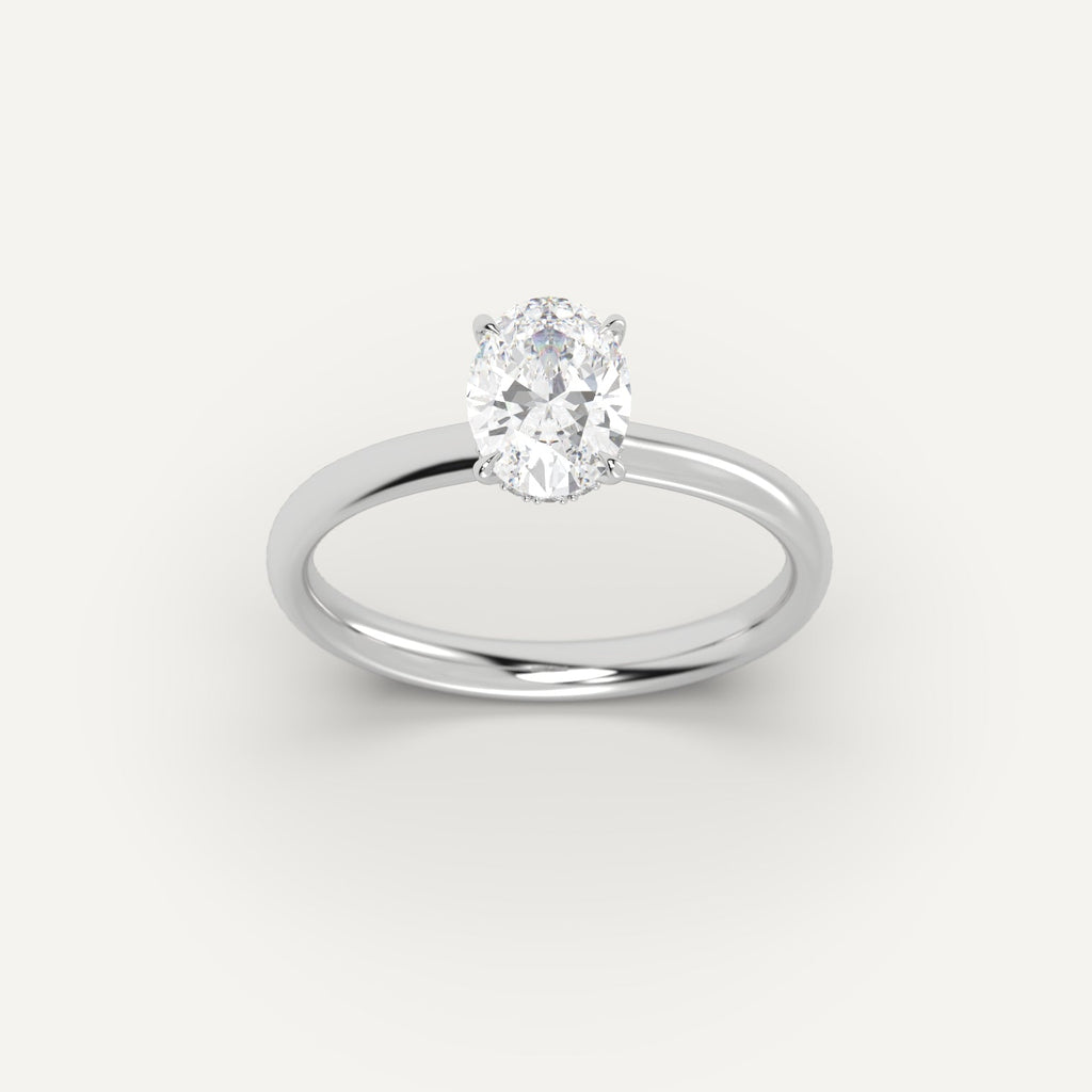 White Gold 1 Carat Engagement Ring On Woman's Hand