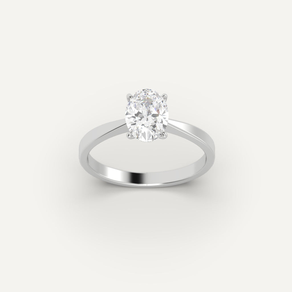 White Gold 1 Carat Engagement Ring On Woman's Hand