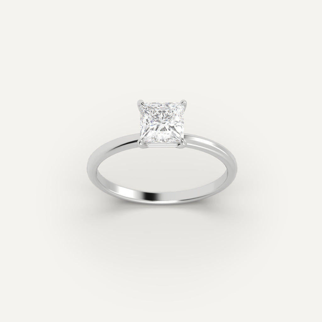 White Gold 1 Carat Engagement Ring On Woman's Hand