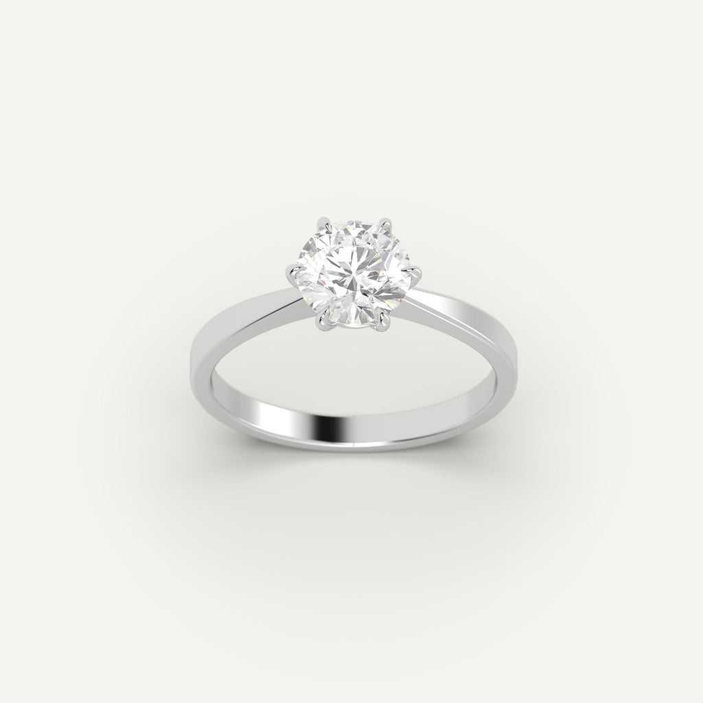 White Gold 1 Carat Engagement Ring On Woman's Hand