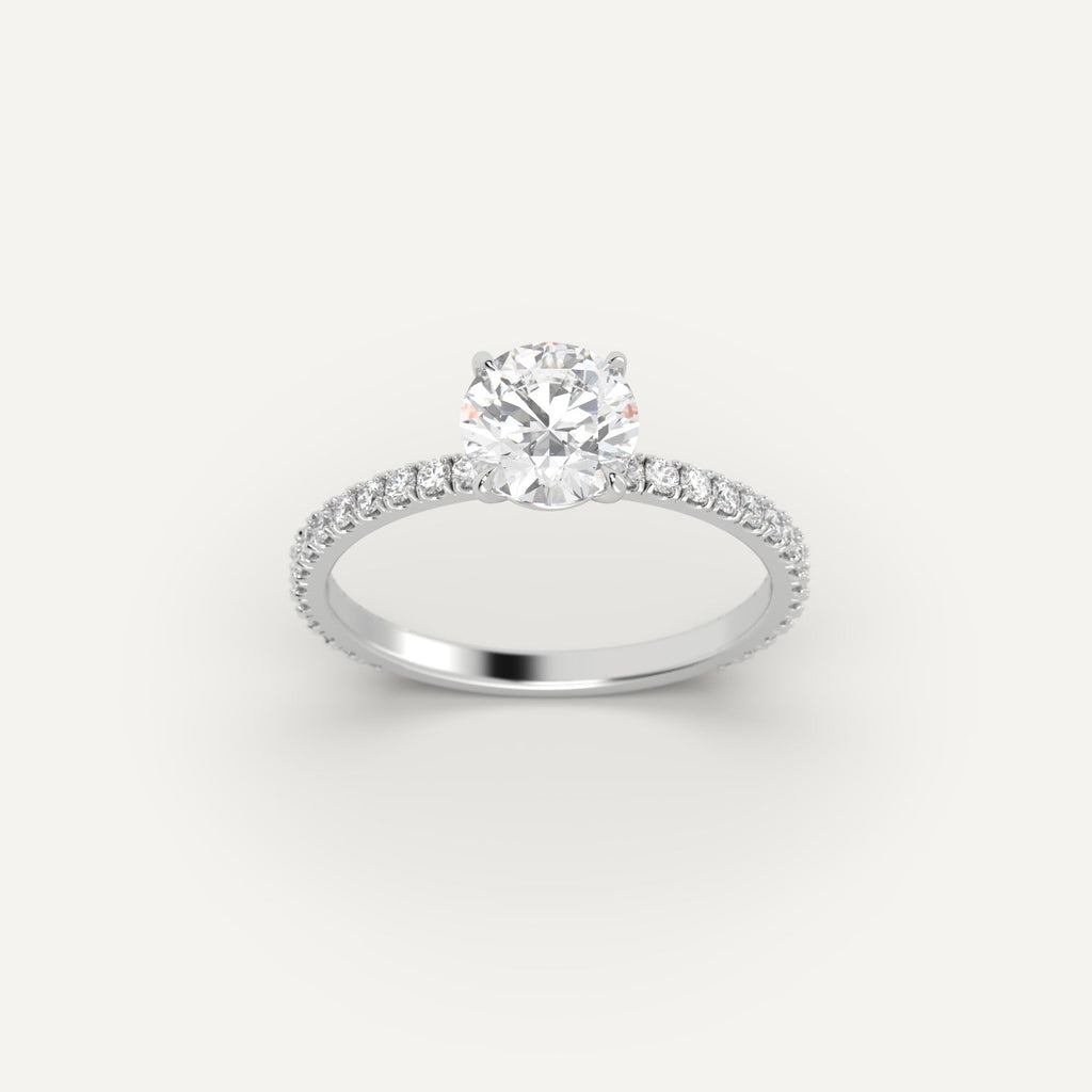 White Gold 1 Carat Engagement Ring On Woman's Hand