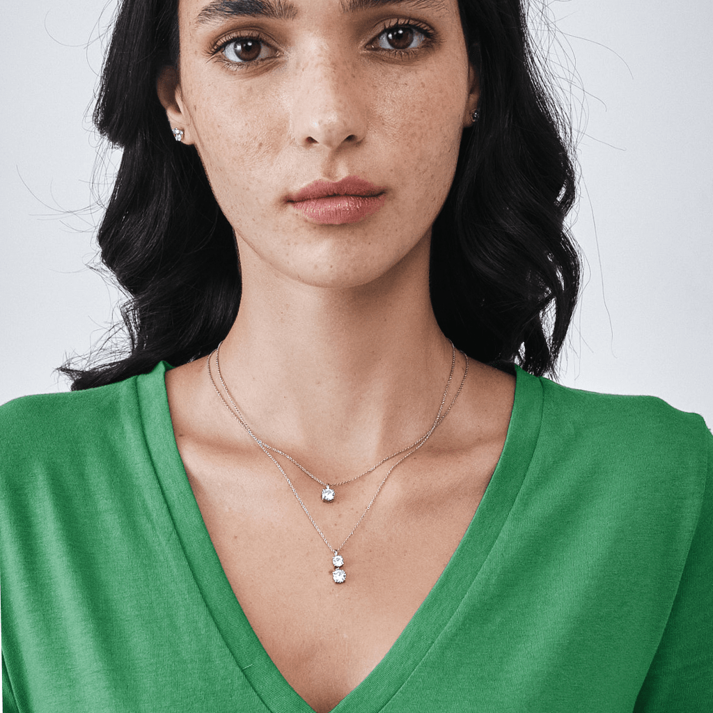 1-carat round lab-grown diamond pendant necklace in white gold with a delicate chain.