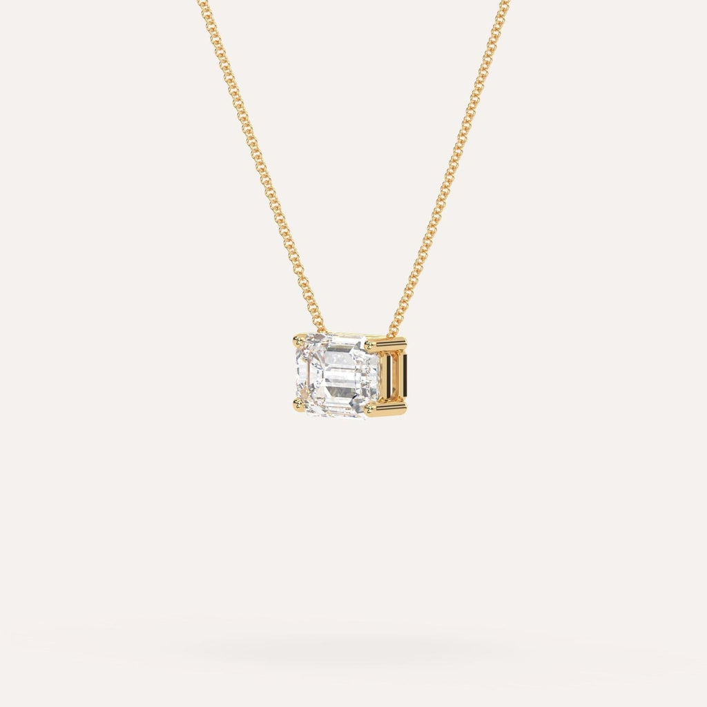 Yellow Gold Floating Diamond Necklace With 2 Carat Emerald Diamond