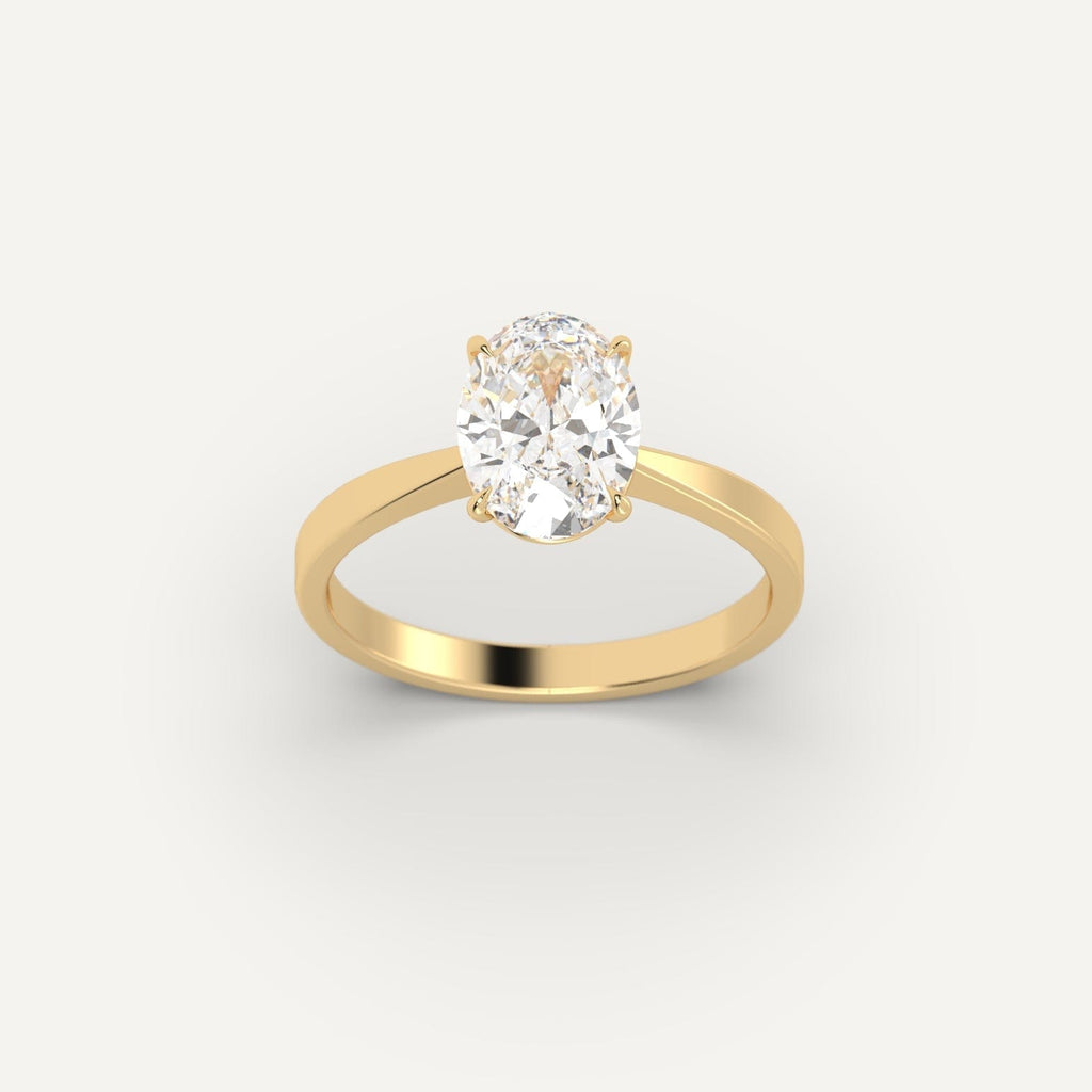 Yellow Gold 2 Carat Engagement Ring On Woman's Hand