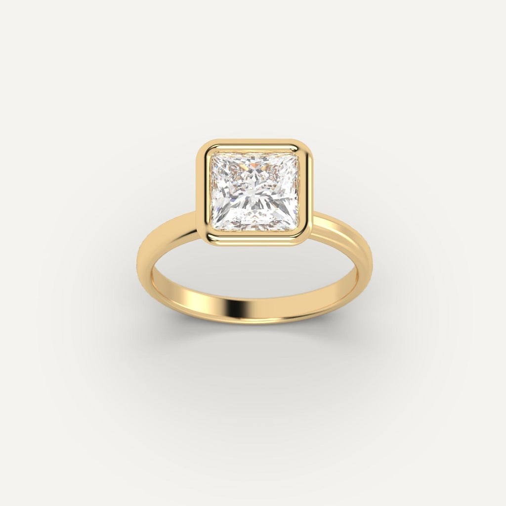 Yellow Gold 2 Carat Engagement Ring On Woman's Hand