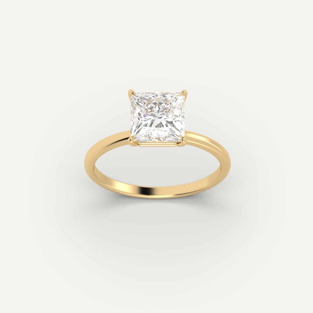 Yellow Gold 2 Carat Engagement Ring On Woman's Hand