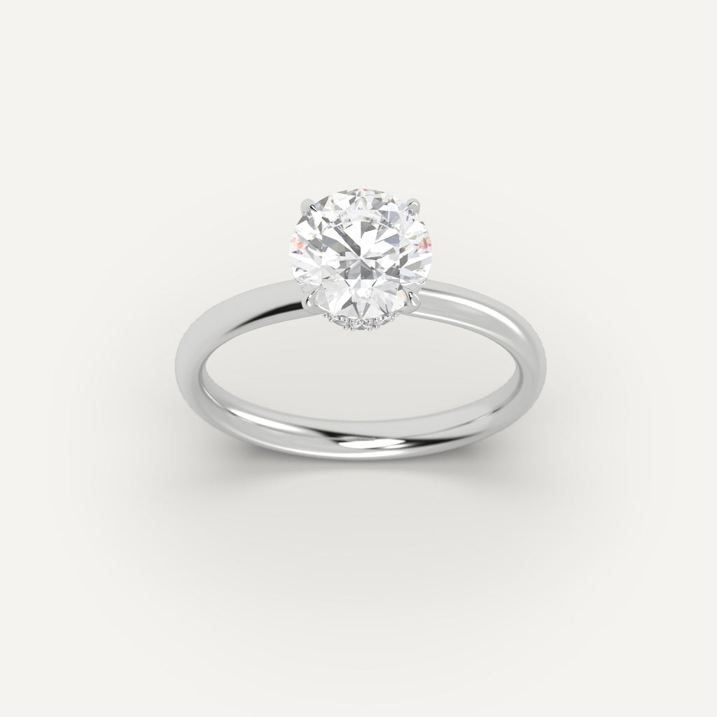 White Gold 2 Carat Engagement Ring On Woman's Hand