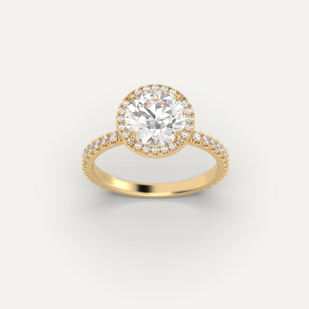 Yellow Gold 2 Carat Engagement Ring On Woman's Hand