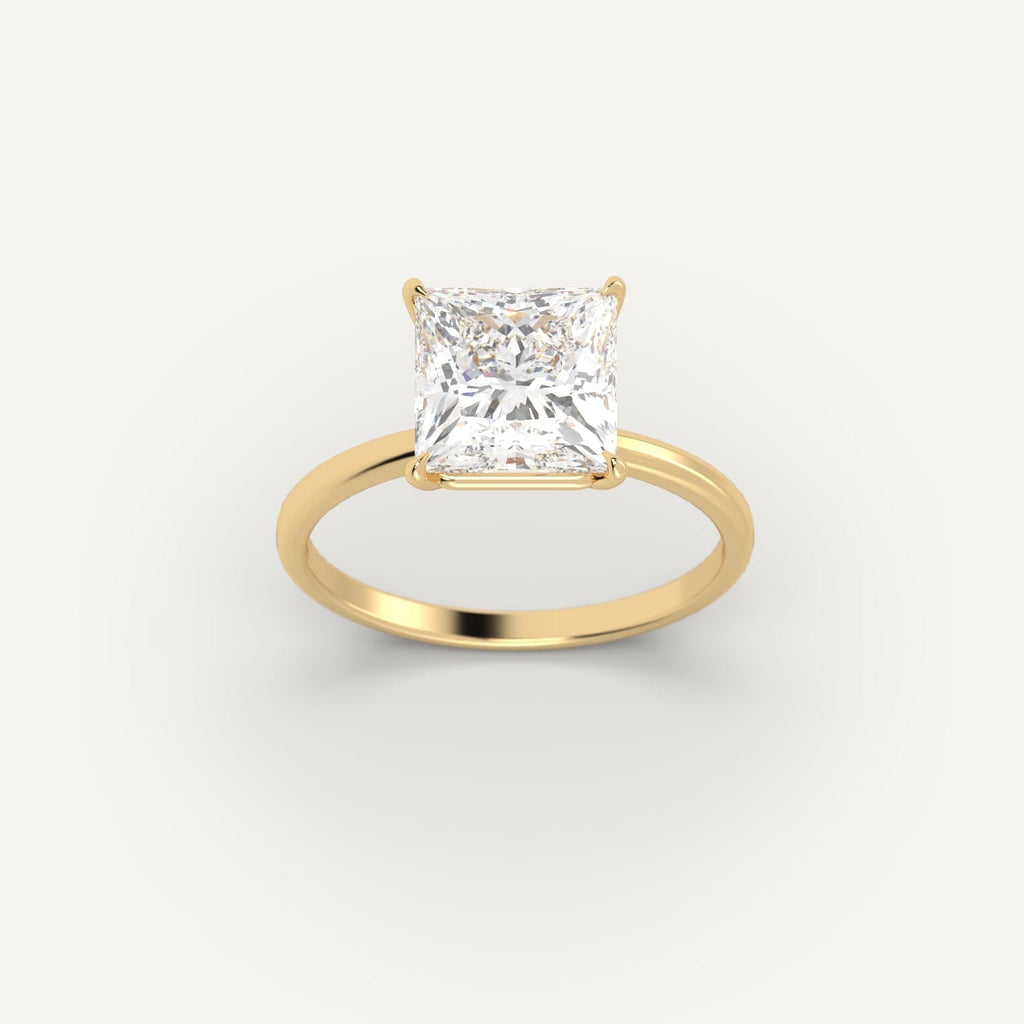 Yellow Gold 3 Carat Engagement Ring On Woman's Hand