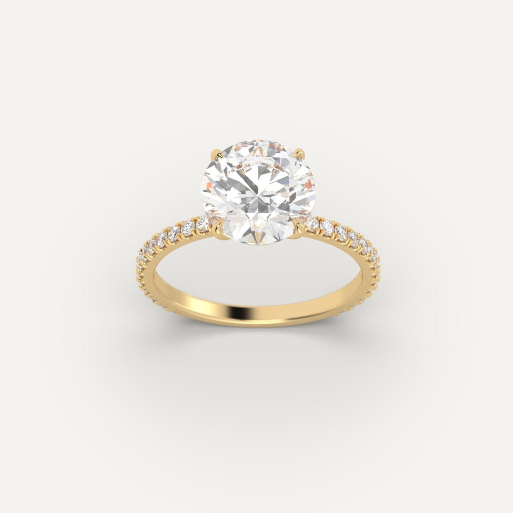 Yellow Gold 3 Carat Engagement Ring On Woman's Hand