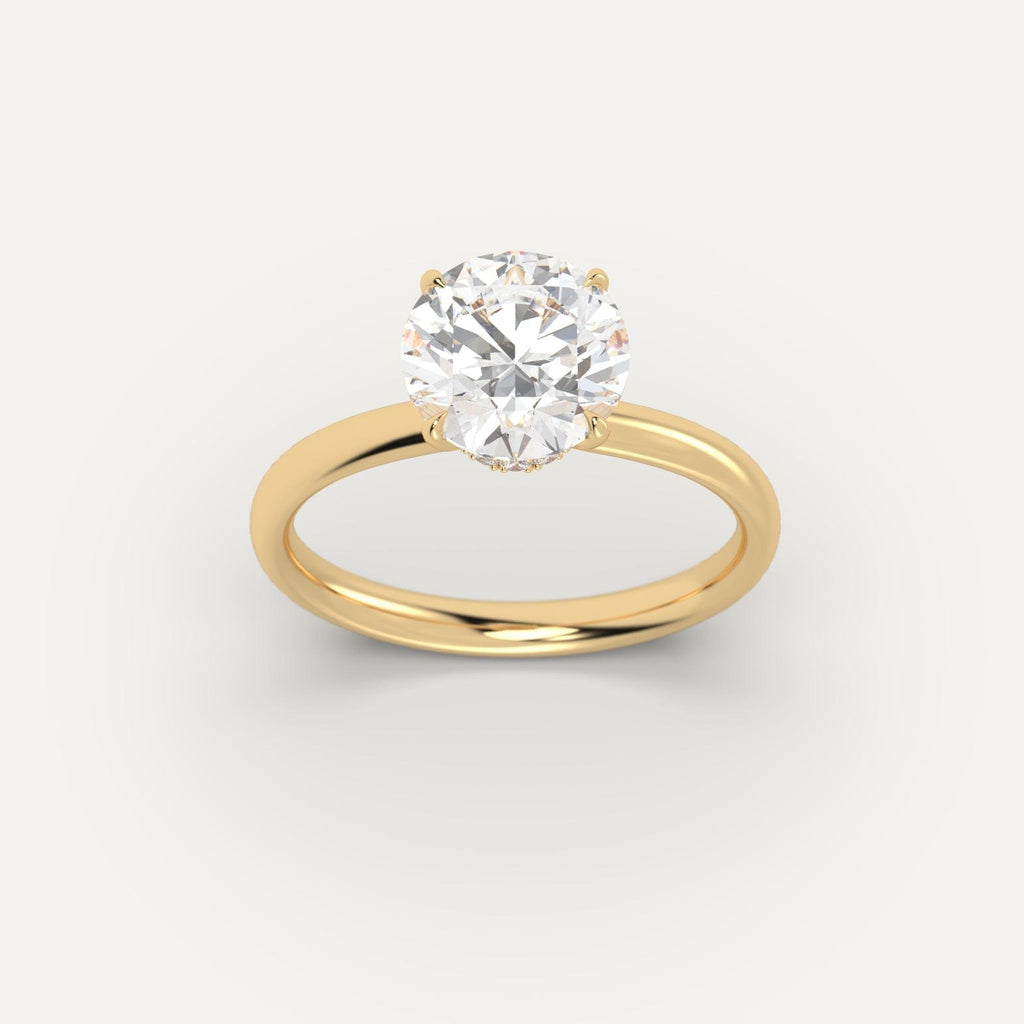 Yellow Gold 3 Carat Engagement Ring On Woman's Hand