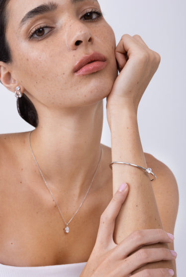 White Gold Single Diamond Bangle and Necklace on Model