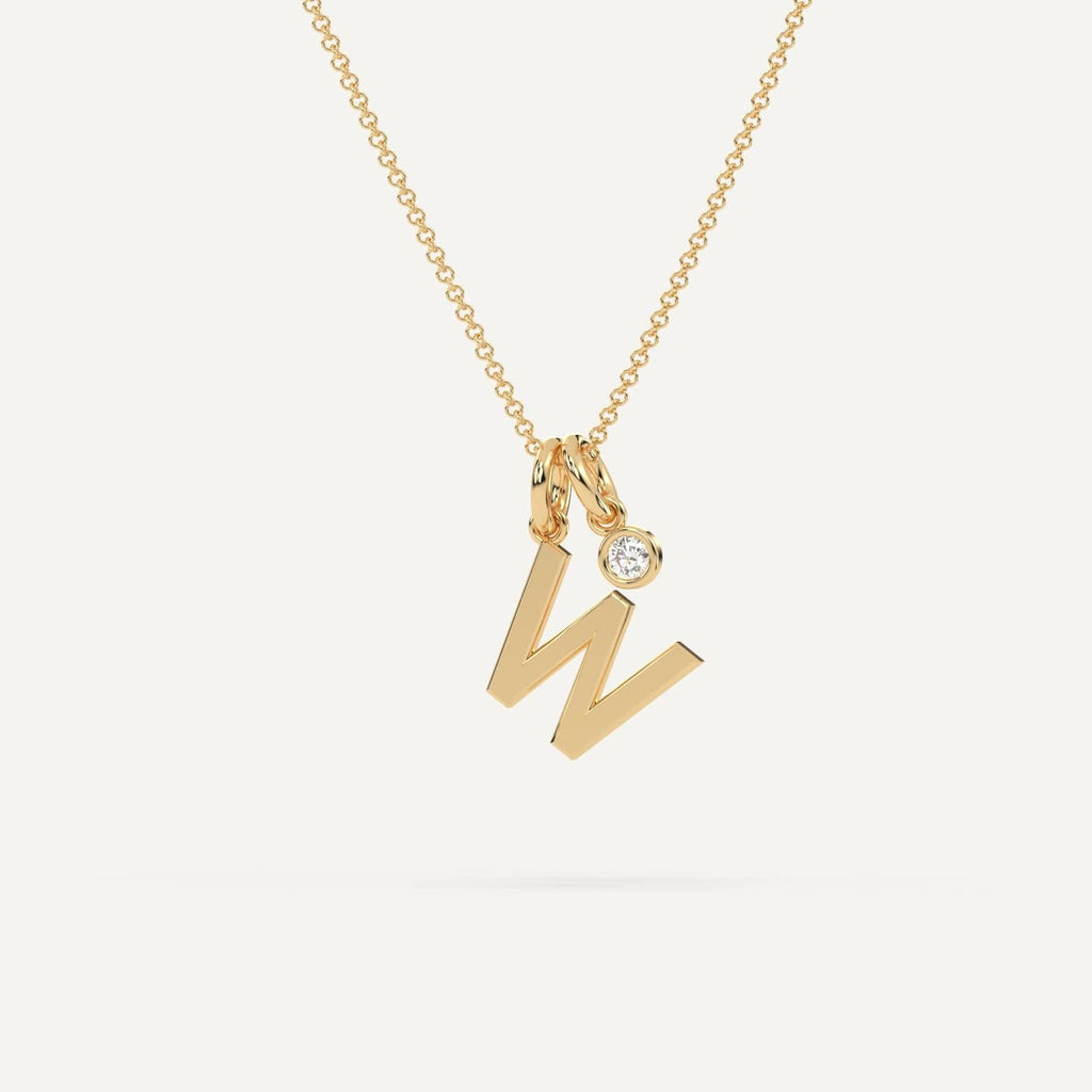 Stylish gold initial W necklace with a sleek pendant on a delicate chain, perfect for personalization.